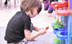 child-playing-in-the-classroom-in-the-toy-box-at-howard-2